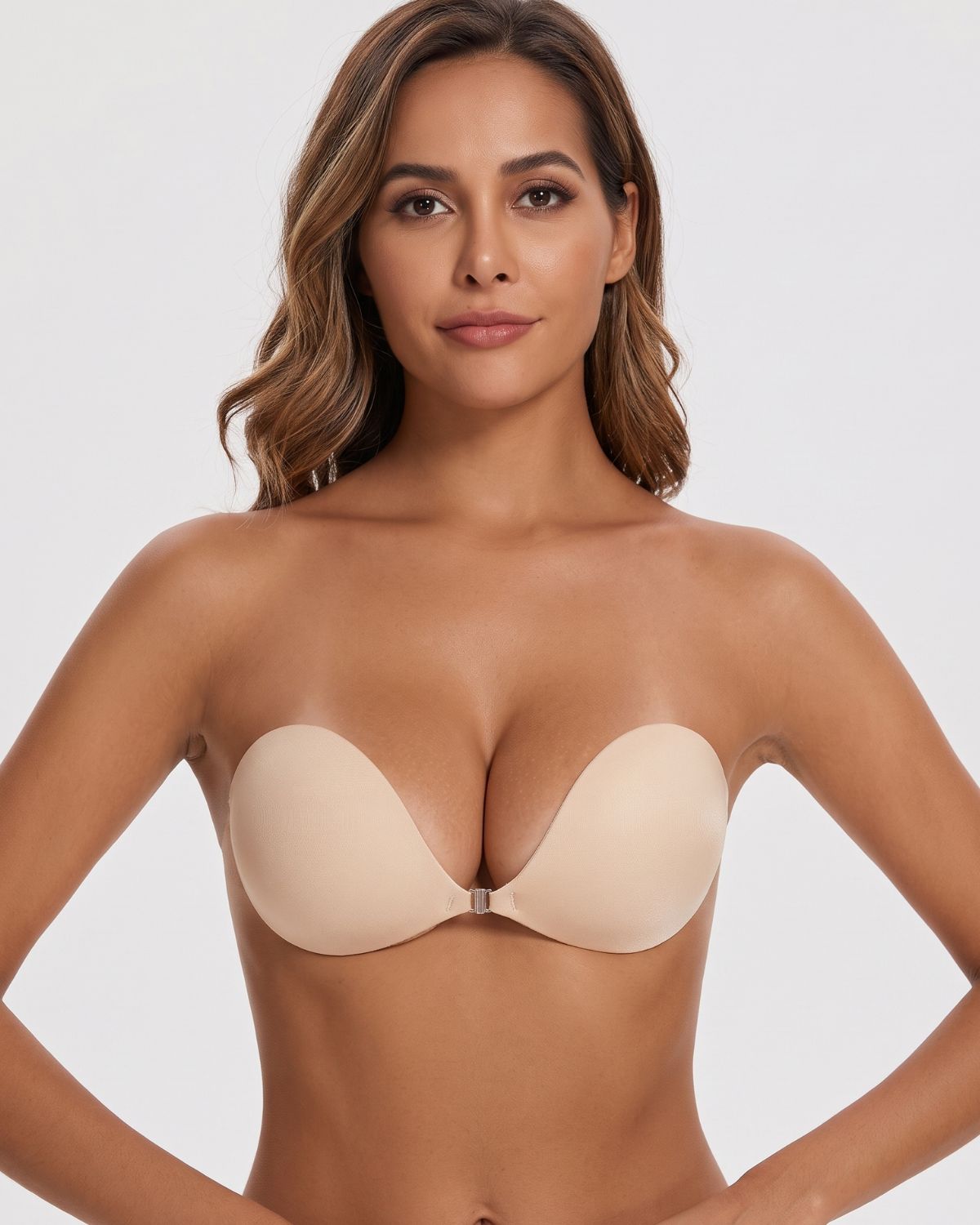 Nude adhesive bra styled with pants